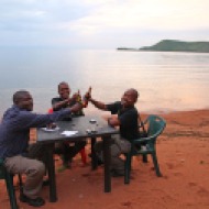 Cheers to Kilimanjaro, Safri and Ndlovu next to Lake Tanganyika in Kigoma, Tanzania
