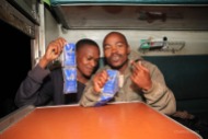 Officers with Pk in a train from Dar-es-Salam to Kapiri Mposhi, Zambia